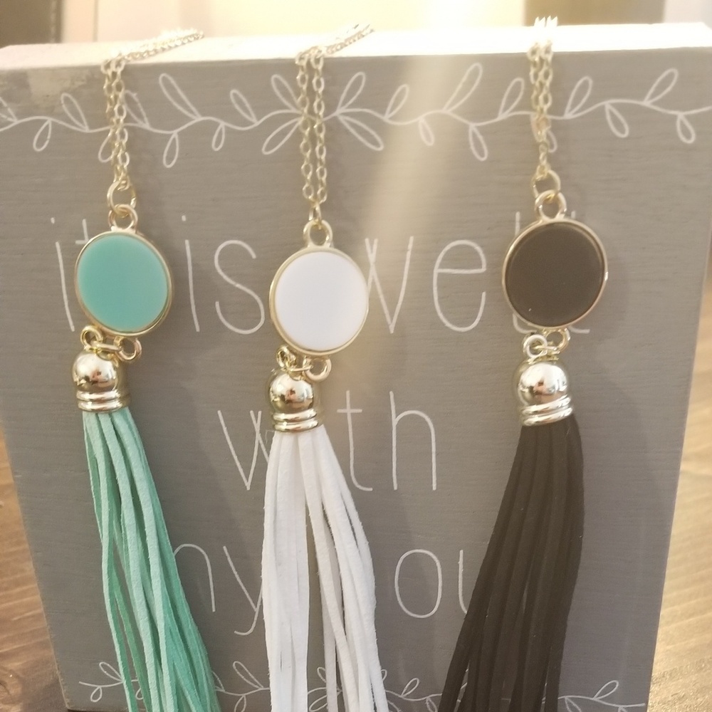 💕3 for $15 💕Gold tone, suedette tassel Pendant.